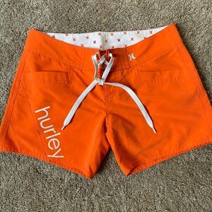 2 pairs! Hurley board shorts women’s size 1 orange and black